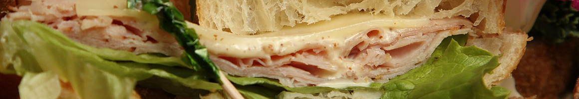 Eating Deli Sandwich at Linden Deli restaurant in Baltimore, MD.